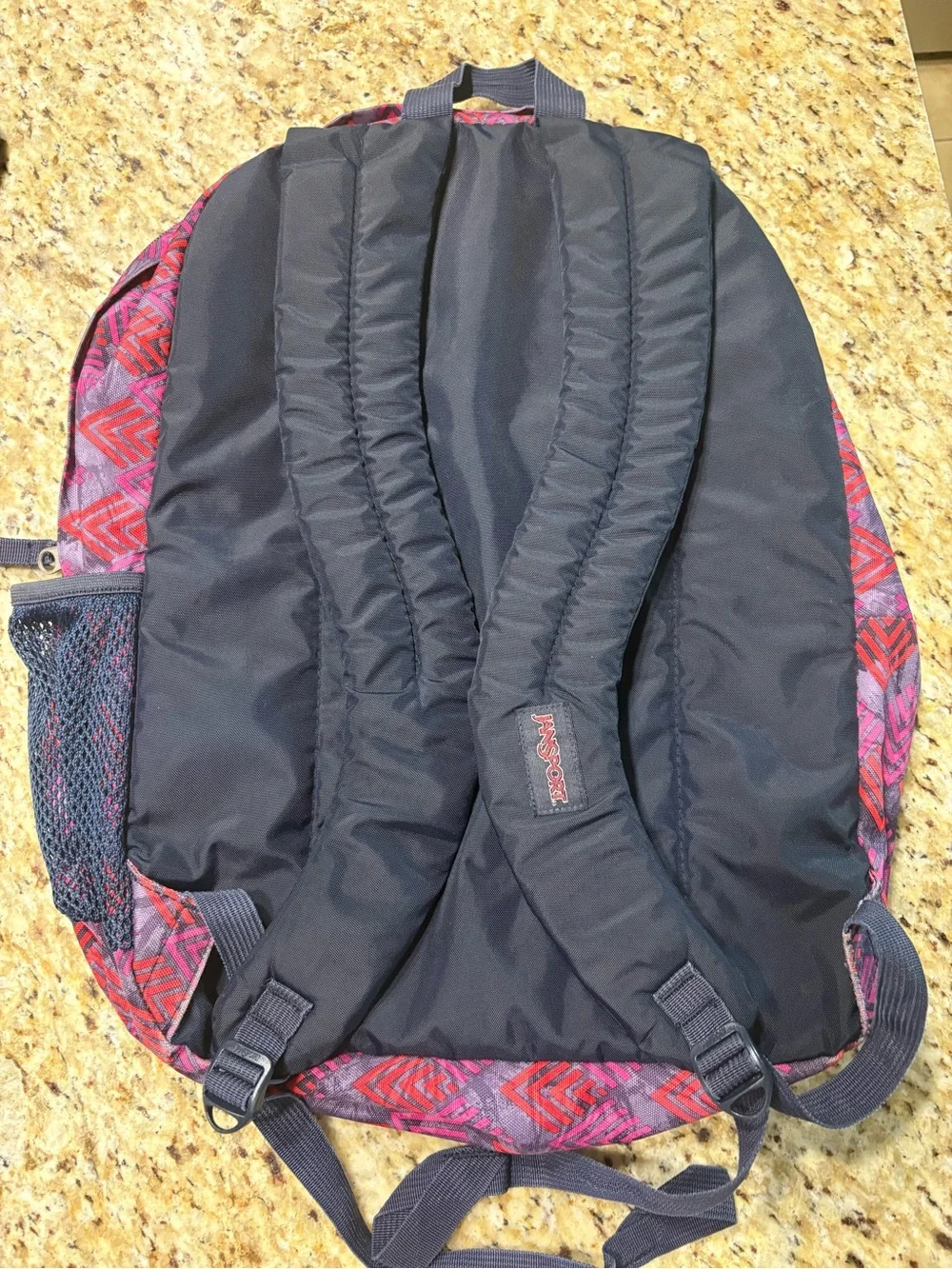 Jansport Purple Backpack with Pink & Red Chevron Print no tears